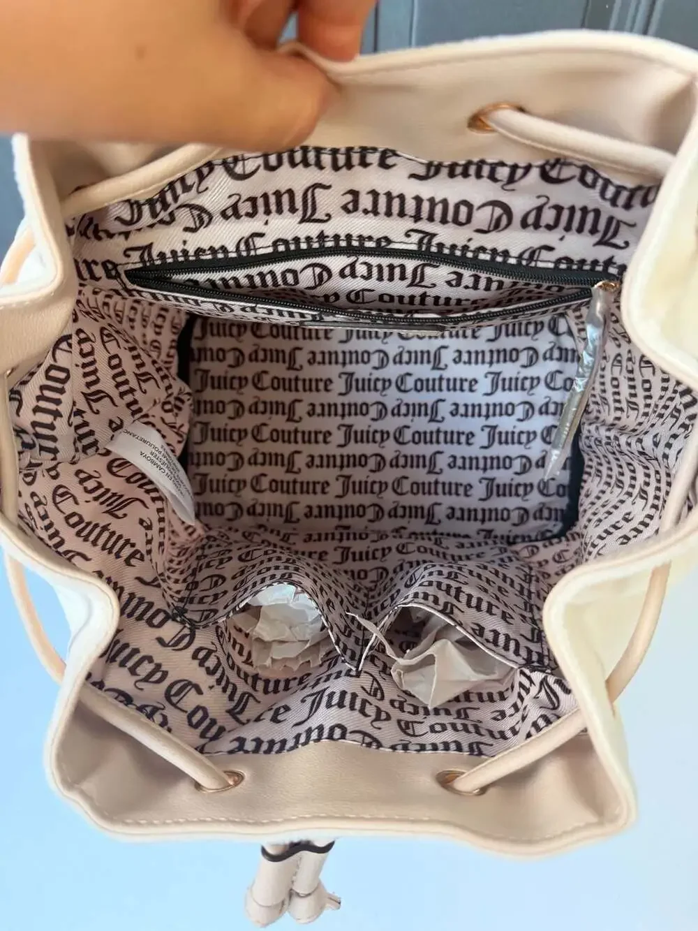 Juicy Couture hardware tags falling
